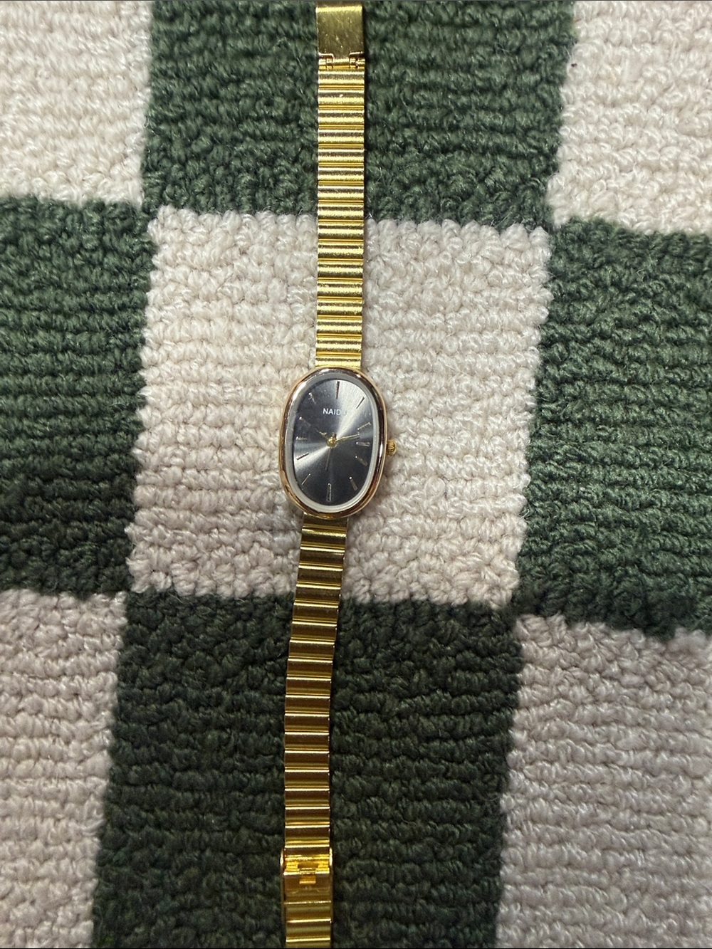 Gold-Tone Ladies Oval Watch with Black Dial by